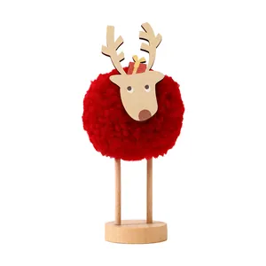 Minimalist creative Christmas reindeer tabletop ornament with red fluffy pom-pom and wooden base