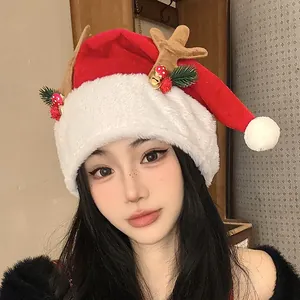Festive red plush Christmas hat featuring reindeer antlers and holiday decorations