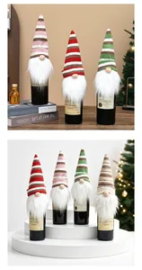 Handmade knitted Christmas gnome wine bottle covers with festive stripe patterns and beards