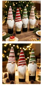 Set of festive gnome wine bottle covers with striped knit hats and white beards