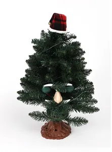 Detailed view of an electric dancing Christmas tree with a cool face and plaid hat