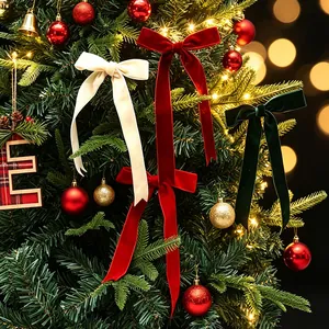 Elegant long velvet bows in red cream and green colors for festive Christmas tree decor