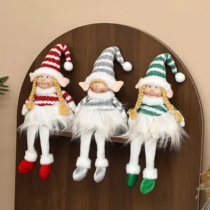 Set de tres muñecos elfos navideños a rayas con piernas largas para decoración.