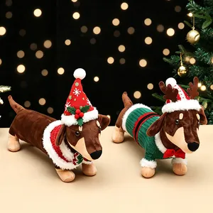 Pair of festive Christmas dachshund plush dolls in Santa hats and reindeer outfits.