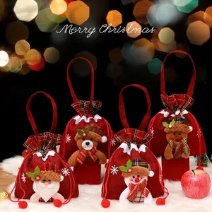 Red Christmas gift bags with 3D Santa and Snowman characters for candy and treats