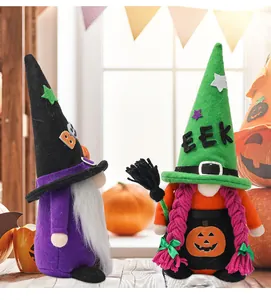 Close-up detail of handmade Halloween gnomes plush toys with witch hats and braided hair