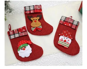 Set of three mini red burlap Christmas stockings with Santa, Reindeer, and Snowman