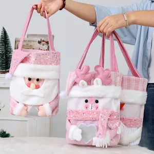 Lindas bolsas de regalo de Navidad rosas con diseños de Papá Noel y renos para niños