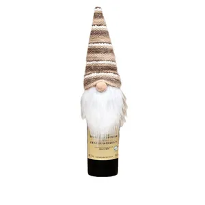 Festive Christmas faceless gnome wine bottle cover with knitted brown striped hat and beard
