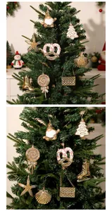 Close-up view of elegant gold electroplated Christmas tree ornaments on pine branches.