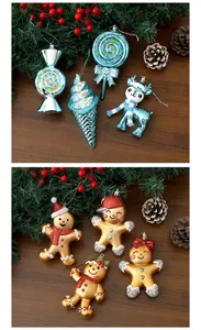 Detailed view of blue and gold Christmas ornaments including gingerbread men and reindeer