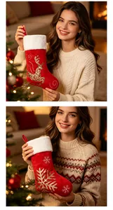 Detailed view of red sequined Christmas stockings with reindeer and snowflake patterns.