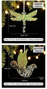 Detail view of green glitter dragonfly and dove Christmas ornaments with measurements