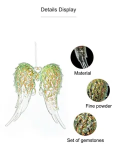 Close-up details of transparent green angel wings Christmas ornament with glitter