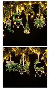 Elegant green glitter Christmas ornaments hanging on pine branches with warm bokeh lights