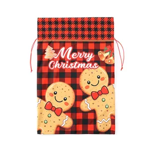 Red buffalo plaid Christmas drawstring gift bag featuring cute gingerbread man characters
