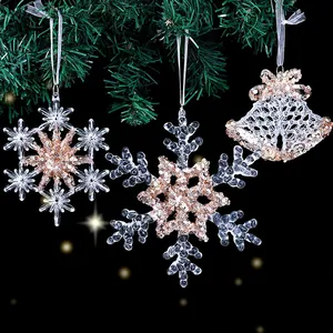 Sparkling acrylic Christmas snowflake and bell ornaments with champagne gold sequins.