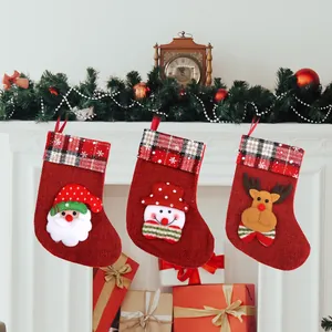 Set of 3 rustic burlap Christmas stockings featuring Santa, Snowman, and Reindeer motifs