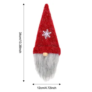 Red Christmas gnome wine bottle cover with long beard and white snowflake detail