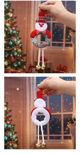 Front and back detail views of a cute snowman Christmas tree ornament with bells.