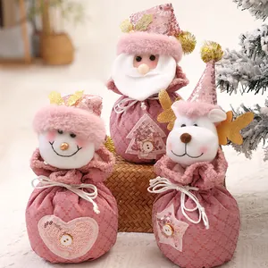 Set aus 3 rosa Pailletten-Weihnachtsgeschenktüten mit Weihnachtsmann und Schneemann.