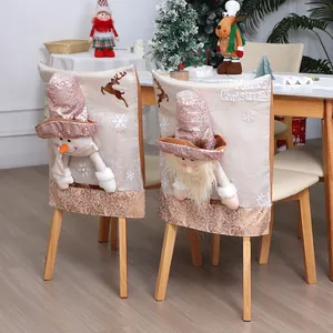 Elegant champagne Christmas chair covers featuring 3D snowman and Santa doll designs