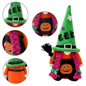 Handmade Halloween gnome doll with green wizard hat and pumpkin apron decoration