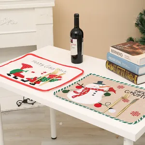 Feestelijke kerstplacemats met Kerstman en Sneeuwpop ontwerpen op jute en stof