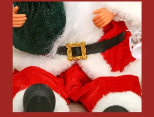 Close-up of Santa Claus figurine with velvet suit and golden belt buckle detail