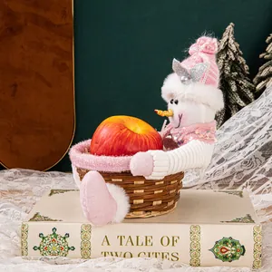Cesta de frutas navideña de peluche de muñeco de nieve rosa con lentejuelas y regalos