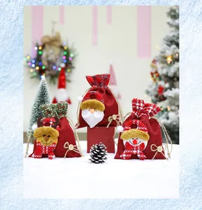 Festive Christmas drawstring burlap gift bags featuring Santa, snowman, and reindeer designs.