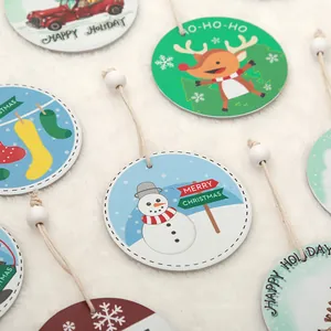 Festive round ceramic Christmas tree ornaments with colorful holiday cartoon designs