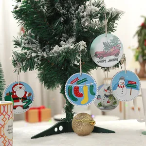 Festive round ceramic Christmas tree ornaments with holiday illustrations for home decor.