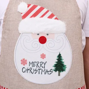 Christmas burlap adult apron featuring a festive Santa Claus and Merry Christmas print