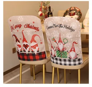 Detail of Christmas gnome chair covers with linen texture and festive grid patterns