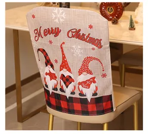 Detailed view of festive Christmas gnome characters on a high-quality burlap chair cover set.