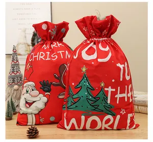 Large red velvet Christmas drawstring gift bags featuring festive Santa Claus prints