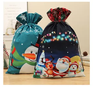 Festive large velvet Christmas drawstring gift bags with Santa and Snowman prints