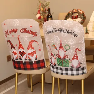 Decorative linen Christmas chair covers with gnome patterns and holiday greetings for dining