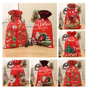 Large red Christmas drawstring gift bags with Santa and reindeer festive designs