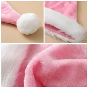Deluxe pink long-hair plush Santa hat with white fur trim and soft pom-pom detail