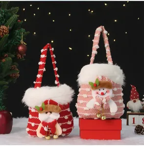 Festive Christmas gift bags with plush Santa and Snowman motifs and fur trim