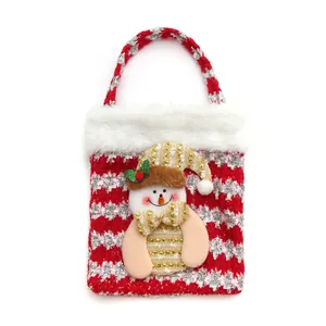 Red and white knitted Christmas gift bag with 3D snowman and plush trim