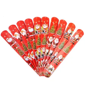 Kräftig rote Weihnachts-Schnapparmbänder mit festlichen Weihnachtsmann- und Baum-Motiven.