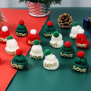 Mini Christmas knitted hats in red white and green with golden LOVE lettering