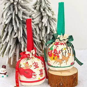 Sacchetti regalo di Natale in tela con Babbo Natale e motivi festivi