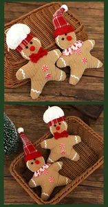 Plush gingerbread man Christmas ornaments in a wicker basket for holiday decor