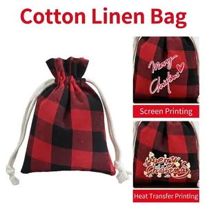 Festive red and black buffalo plaid drawstring gift bag for Christmas candy and treats