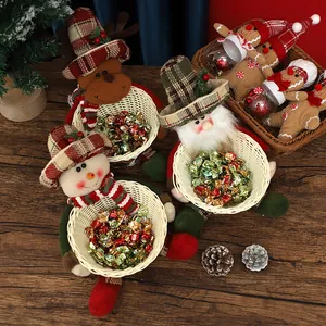 Festive Christmas character candy baskets including Santa, Snowman and Reindeer