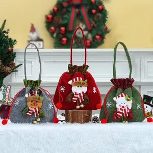 Set of 3 Christmas drawstring gift bags with Santa, Reindeer, and Snowman designs